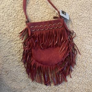 Burgundy purse with fringe and metal detail, Never used, Tag still on